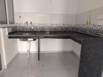 Kitchen Image of 600 Sq.ft 1 BHK Apartment / Flat for rent in Karma Rejoice, Undri Pune for Rs. 13500