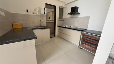 Kitchen Image of 990 Sq.ft 2 BHK Duplex for rent in Geras Planet Of Joy, Upper Kharadi Pune for Rs. 33000