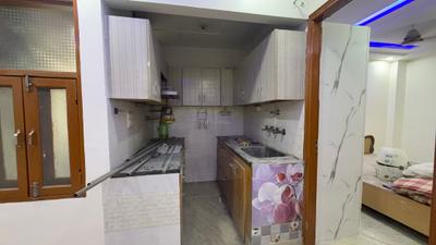 Kitchen Image of 558 Sq.ft 2 BHK Apartment / Flat for sale in Dwarka Mor New Delhi for Rs. 3300000
