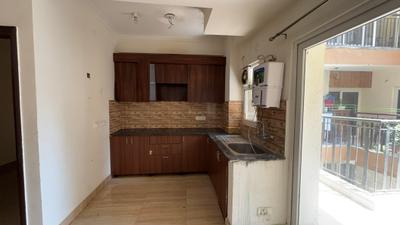 Kitchen Image of 990 Sq.ft 2.5 BHK Apartment / Flat for sale in NBCC Tropical Garden, Noida Extension Greater Noida for Rs. 7612000