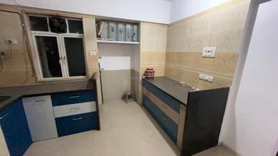Kitchen Image of 825 Sq.ft 2 BHK Apartment / Flat for rent in Kashish Park Tower, Dharamveer Nagar Thane for Rs. 52000