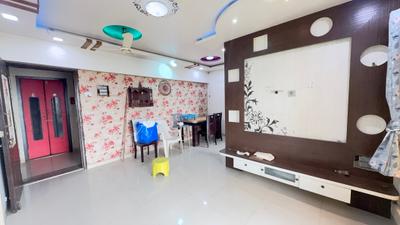 Living Room Image of 1060 Sq.ft 2 BHK Apartment / Flat for sale in Unique Aurum, Mira Road East Mira Bhayandar for Rs. 12000000