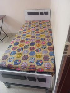 Bedroom Image of S.L.N Studio rooms for boys  in Kadubeesanahalli, Bangalore