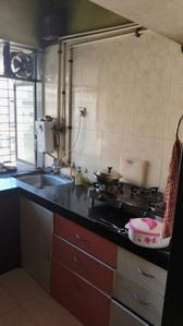 Kitchen Image of 900 Sq.ft 2 BHK Apartment / Flat for sale in Kashish Park, Dharamveer Nagar Thane for Rs. 13451000