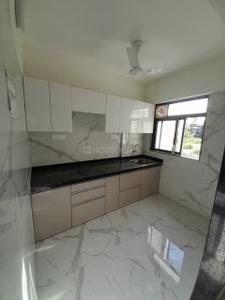 Kitchen Image of 950 Sq.ft 2 BHK Apartment / Flat for sale in Shikara Pearl Phase I, Nere Navi Mumbai for Rs. 4800000