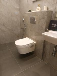Common Bathroom Image of 1040 Sq.ft 2 BHK Apartment / Flat for sale in Dosti Greenscapes Phase 3, Hadapsar Pune for Rs. 9499000