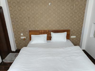 Bedroom Image of Comfort PG for Boys in Sector 26, Noida