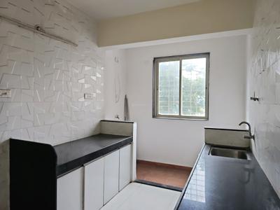 Kitchen Image of 950 Sq.ft 2 BHK Apartment / Flat for rent in Gagan Adira by Gagan Developers, Wagholi Pune for Rs. 30500