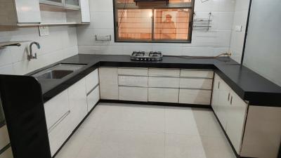 Kitchen Image of 1970 Sq.ft 3 BHK Apartment / Flat for sale in Raghuvir Shyam Palace, Vesu Surat for Rs. 13500000