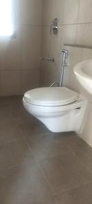 Bathroom Image of 1403 Sq.ft 3 BHK Apartment / Flat for rent in Pride World City, Charholi Budruk Pune for Rs. 32000