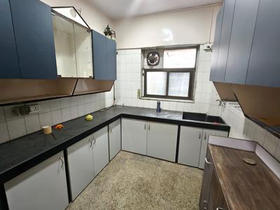 Kitchen Image of 950 Sq.ft 2 BHK Apartment / Flat for rent in Gokul Plaza, Kandivali East Mumbai for Rs. 47000