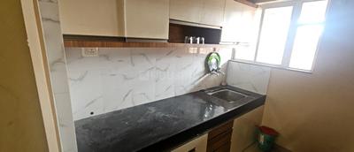 Kitchen Image of 550 Sq.ft 1 BHK Apartment / Flat for rent in Maple Aapla Ghar Lonikand, Lonikand Pune for Rs. 19000