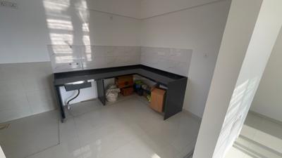 Kitchen Image of 1166 Sq.ft 3 BHK Apartment / Flat for sale in Shaligram Pavillia, Gahunje Pune for Rs. 7100000