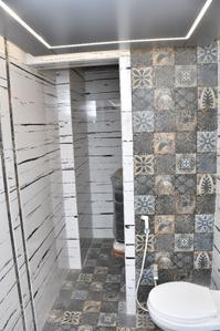Bathroom Image of 688 Sq.ft 1 BHK Apartment / Flat for sale in GBK Vishwajeet Precious Phase 1, Ulhasnagar Thane for Rs. 3700000