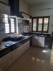 Kitchen Image of 3200 Sq.ft 4 BHK Independent House for rent in Devaditya Group Devaditya Devalayam Bungalows, Ambli Ahmedabad for Rs. 120000