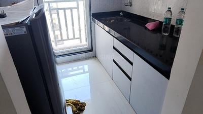 Kitchen Image of 460 Sq.ft 1 BHK Apartment / Flat for rent in Raunak Bliss, Kasarvadavali Thane for Rs. 25000