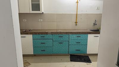 Kitchen Image of 1080 Sq.ft 2 BHK Apartment / Flat for rent in Adani The Meadows, Shantigram Ahmedabad for Rs. 24000