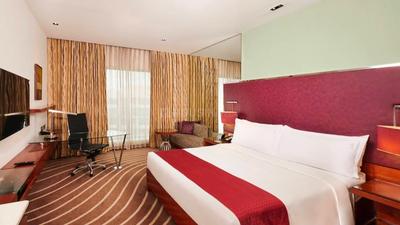 Bedroom Image of Hotel Holiday resort  in Goregaon West, Mumbai