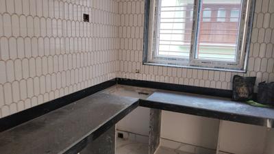 Kitchen Image of 950 Sq.ft 2 BHK Apartment / Flat for sale in Belghoria Kolkata for Rs. 4200000