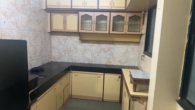 Kitchen Image of 900 Sq.ft 2 BHK Apartment / Flat for rent in Jagdish Agashe Sheetal Baug Society, Bhosari Pune for Rs. 21000