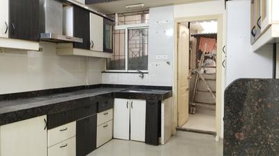 Kitchen Image of 1000 Sq.ft 2 BHK Apartment / Flat for rent in Eisha Varsha Appartments, Wanwadi Pune for Rs. 28000