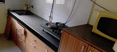 Kitchen Image of 800 Sq.ft 2 BHK Apartment / Flat for rent in Raunak Unnathi Greens, Kasarvadavali Thane for Rs. 29000