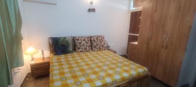 Bedroom Image of Akarshan boy coliving pg in Safdarjung Enclave, New Delhi