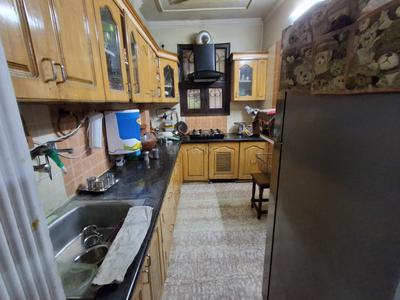 Kitchen Image of 1000 Sq.ft 2 BHK Apartment / Flat for sale in Vikaspuri New Delhi for Rs. 13500000