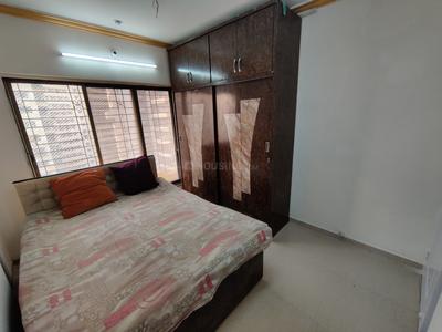 Bedroom Image of 1000 Sq.ft 2 BHK Apartment / Flat for sale in Aman Spring, Kandivali West Mumbai for Rs. 15800000