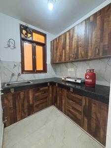 Kitchen Image of 700 Sq.ft 2 BHK Independent House for rent in Hilltop Apartments, Maidan Garhi New Delhi for Rs. 24444