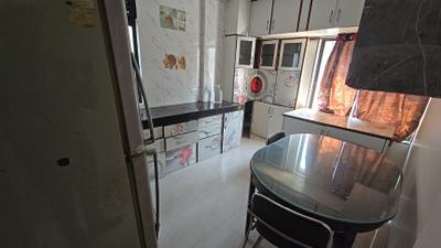 Kitchen Image of 1000 Sq.ft 2 BHK Apartment / Flat for rent in Darode Shreeniwas Bhushan, Karve Nagar Pune for Rs. 32000
