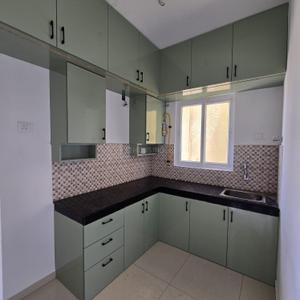 Kitchen Image of 888 Sq.ft 2.5 BHK Apartment / Flat for rent in Urbanrise Revolution One, Padur Chennai for Rs. 25000
