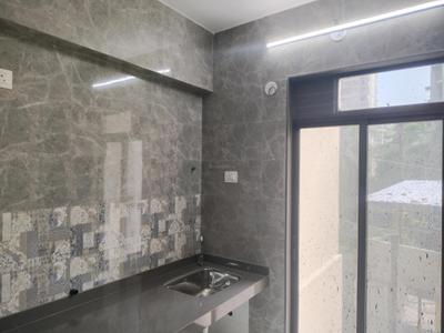 Kitchen Image of 710 Sq.ft 1 BHK Apartment / Flat for rent in Raunak Bliss Phase A A3, Kasarvadavali Thane for Rs. 18500