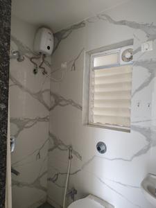 Common Bathroom Image of 750 Sq.ft 1 BHK Apartment / Flat for rent in Unnati Woods Phase 7, Kasarvadavali Thane for Rs. 17500