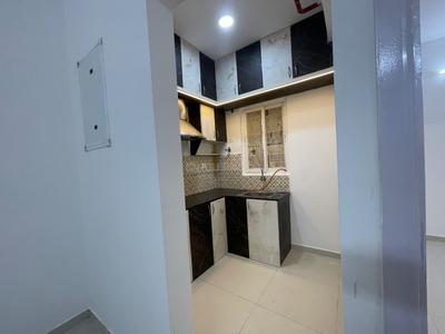 Kitchen Image of 662 Sq.ft 2 BHK Apartment / Flat for rent in Urbanrise Revolution One, Padur Chennai for Rs. 24000
