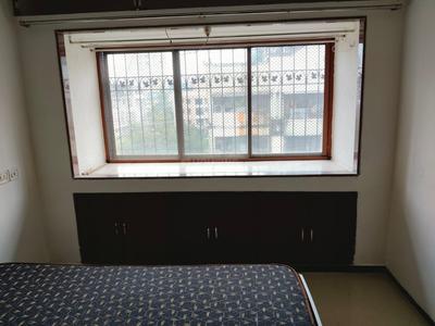 Bedroom Image of Ravindra PG in Goregaon West, Mumbai