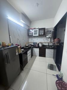 Kitchen Image of 1350 Sq.ft 2 BHK Apartment / Flat for sale in Shiv Sharnam Antlia, Janta Nagar Ahmedabad for Rs. 4600000