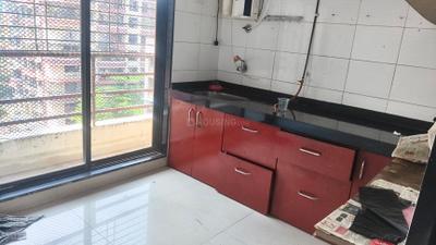 Kitchen Image of 1110 Sq.ft 2 BHK Apartment / Flat for rent in Bhoomi Symphony, Kopar Khairane Navi Mumbai for Rs. 49000