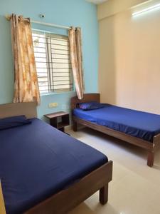 Bedroom Image of Saptha Srinivasa pg in Electronic City, Bengaluru