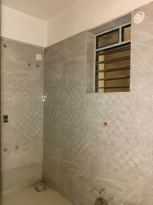 Common Bathroom Image of 616 Sq.ft 1 BHK Apartment / Flat for sale in Cosmos Meluha, Khidkali Thane for Rs. 4700000