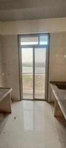 Kitchen Image of 1050 Sq.ft 2 BHK Apartment / Flat for rent in Mangeshi Dhara, Thakurli Thane for Rs. 24000