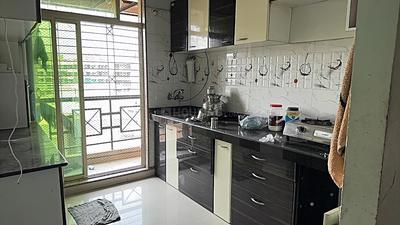 Kitchen Image of 650 Sq.ft 1 BHK Apartment / Flat for sale in Manohar Shreeji Nirvana II, Badlapur East Badlapur for Rs. 2600000