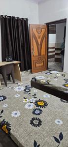 Bedroom Image of Somo pg for girls  in Sector 134, Noida