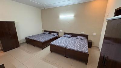 Bedroom Image of PG for boys  in Peer Muchalla, Zirakpur