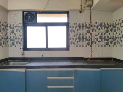Kitchen Image of 575 Sq.ft 1 BHK Apartment / Flat for sale in Unnati Woods Phase 7, Kasarvadavali Thane for Rs. 5500000