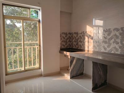 Kitchen Image of 711 Sq.ft 1 BHK Apartment / Flat for sale in Pushpak Nagar Navi Mumbai for Rs. 4376000