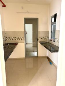 Kitchen Image of 900 Sq.ft 2 BHK Apartment / Flat for sale in Mahindra Happinest Tathawade, Tathawade Pune for Rs. 7200000
