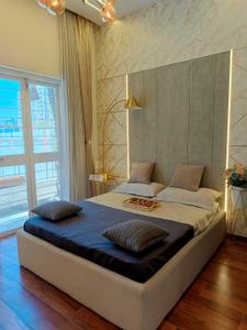 Bedroom Image of 975 Sq.ft 2 BHK Apartment / Flat for sale in Kosmic Kourtyard Phase 2, Wagholi Pune for Rs. 6900000