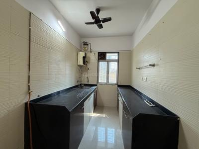 Kitchen Image of 800 Sq.ft 2 BHK Apartment / Flat for rent in Cosmos Classique, Hiranandani Estate Thane for Rs. 35000