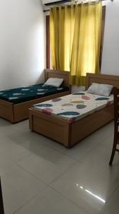 Bedroom Image of Feel like home girls PG in Sector 16A, Noida